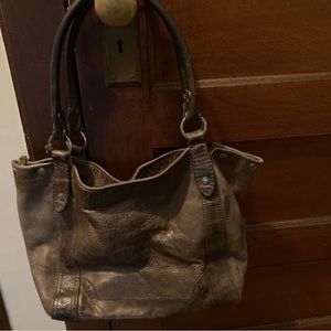 Frye bag. Brown. Interior clean. Exterior could use some leather cleaner.